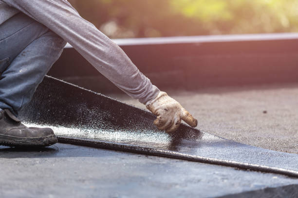 Professional Exterior Waterproofing technician working in East Lansing, MI